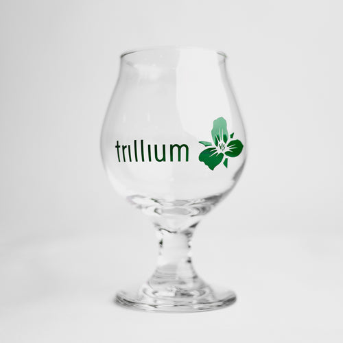 Clear Tulip glass with green Trillium flower logo