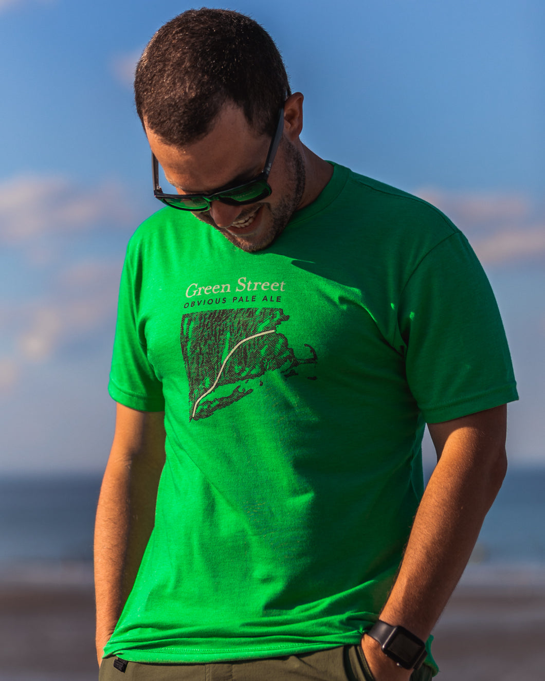 Male wearing green t-shirt