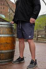 Load image into Gallery viewer, Mens navy blue shorts with Trillium flower logo
